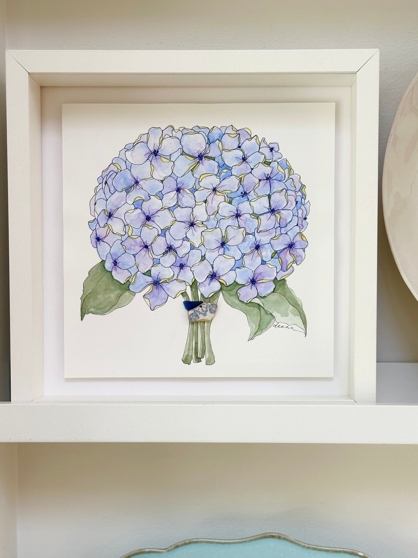 Watercolour and ink floral artwork with found glass or china used as a holder.