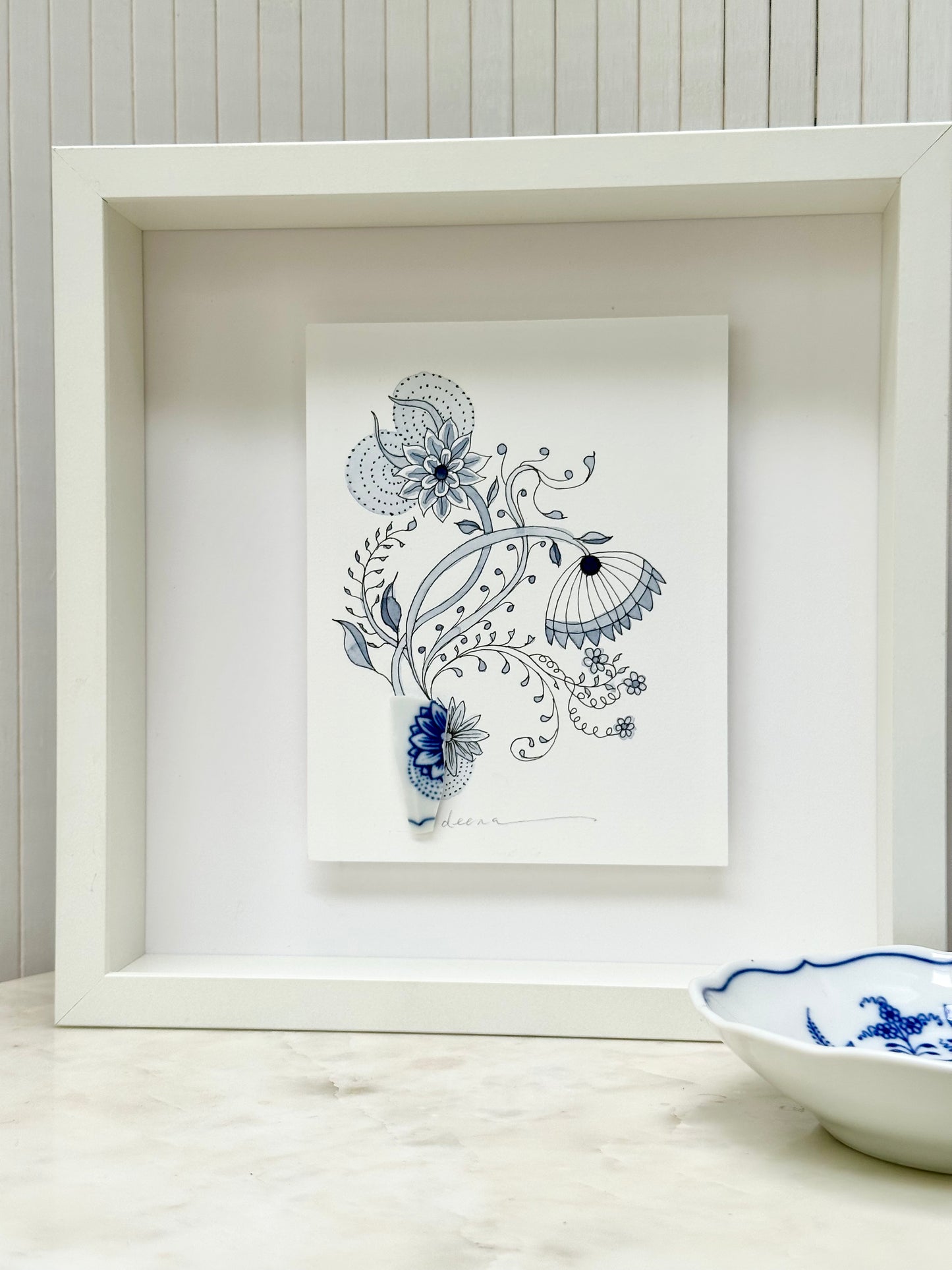 Original mixed media artwork featuring hand-painted flowers with a reclaimed glass shards as a sculptural vase. Unique, sustainable wall art framed and ready to hang.